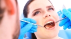 Нанесение реминерализирующего препарата на зуб