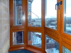 Остекление балкона деревянными окнами (сосна)